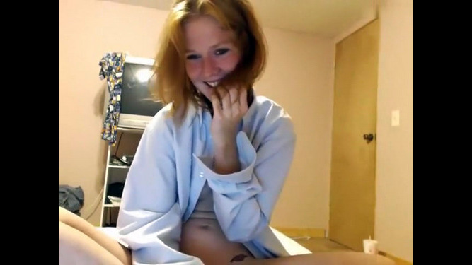 Puffy sandy-haired student on webcam,